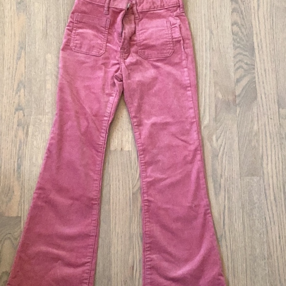 Pink velvet retro flare pants.